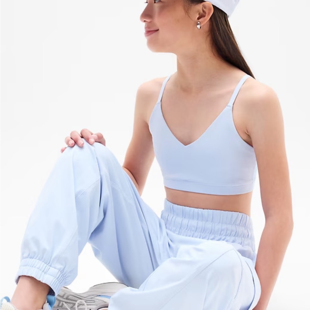 Athleta Girl two pack Right Moves sports bras; adjustable straps